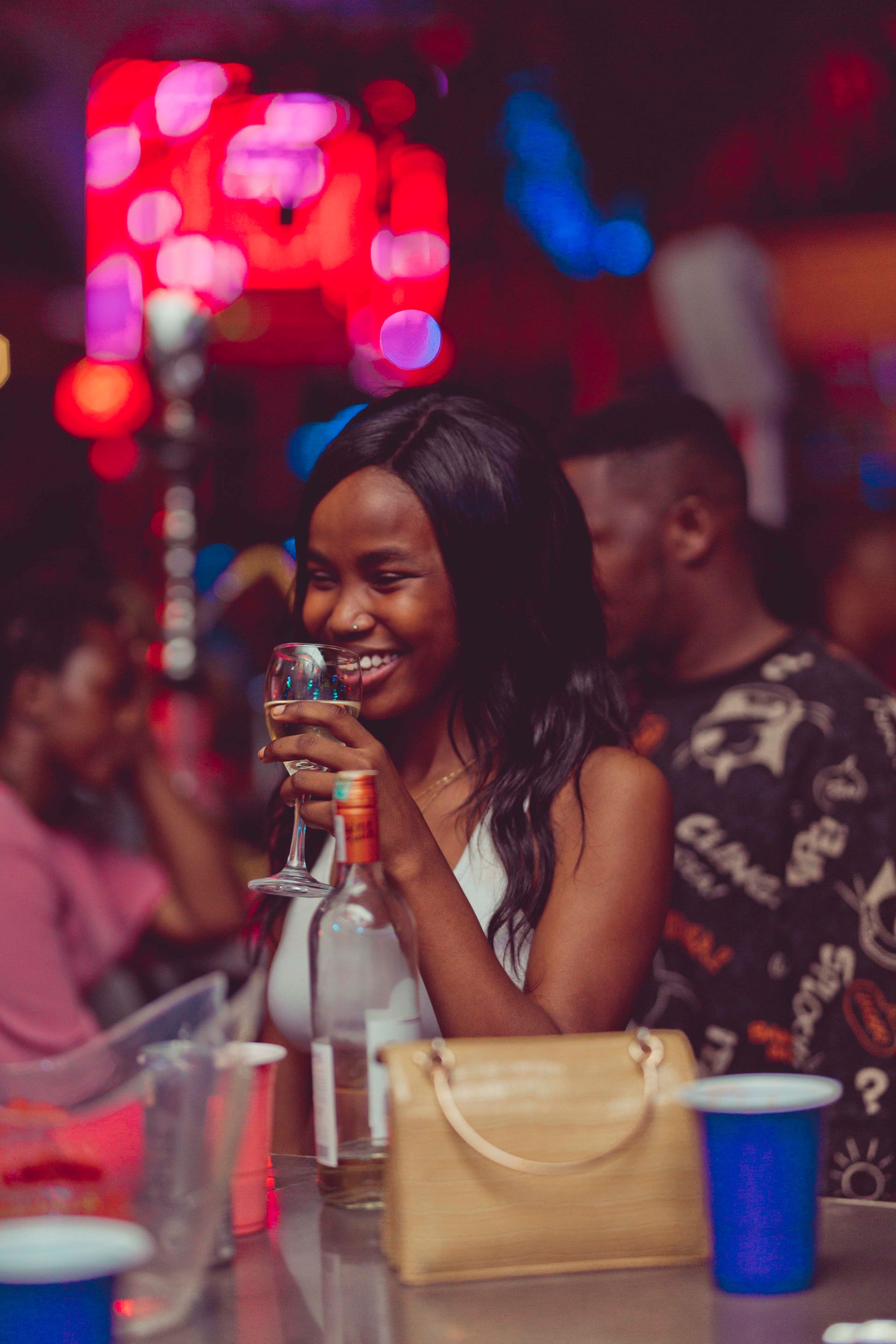lady drinking at a bar